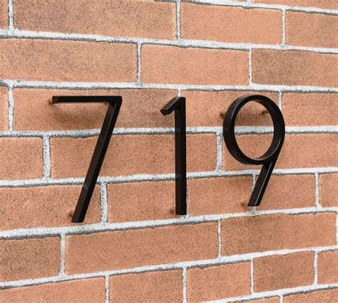 house numbers metal black floating on brick wall|brick house numbers drilling.